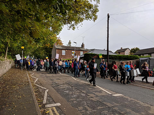 Supporters heading down Fell Lane